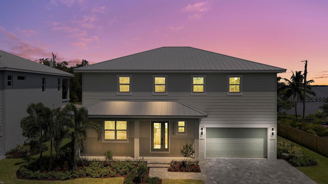 Front exterior of a new home in , Jensen Beach, FL, highlighting curb appeal (Image 2).