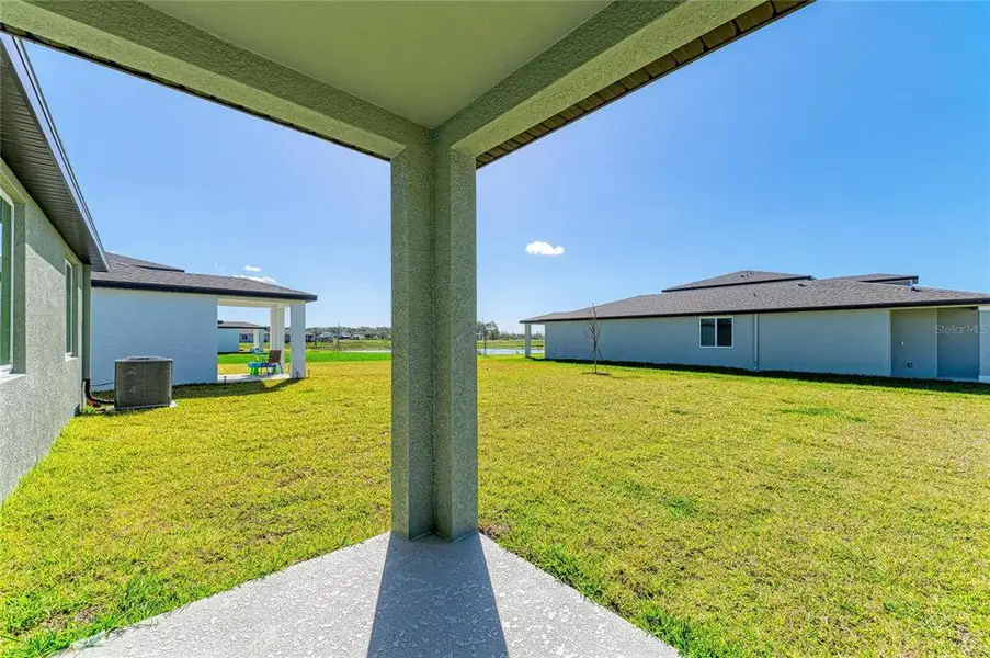 Exterior details and patio area of a home in Magnolia Bay - Classic Series, Nokomis (Image 3).