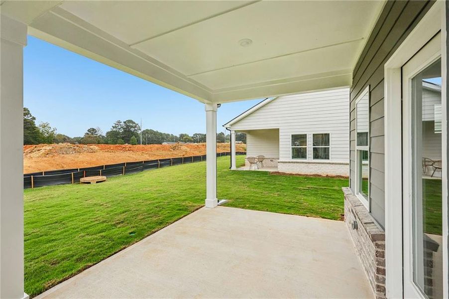Exterior details and patio area of a home in Westmont Preserve, Powder Springs (Image 3).