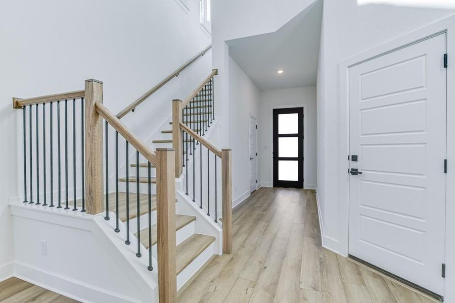 Entry - Stairway  [Photo shown is from a completed home with the same floorplan and similardesign selections.]