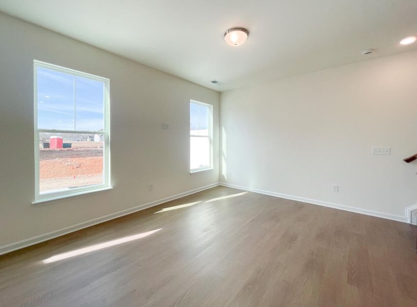 Spacious, unfurnished interior of a new home in Bellevue Townhomes, Greenville (Image 15).