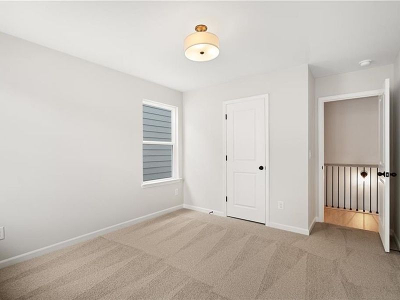 Spacious, unfurnished interior of a new home in The Village at Shallowford, Kennesaw (Image 26).