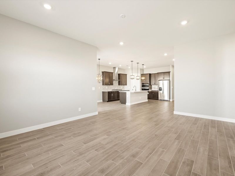 Spacious, unfurnished interior of a new home in Blossom Rock Reserve Series, Apache Junction (Image 12). Spacious, unfurnished interior of a new home in Blossom Rock Reserve Series, Apache Junction (Image 12).