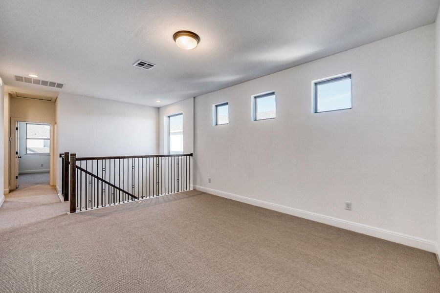 Spacious, unfurnished interior of a new home in The Porch at Du Pre, Buda (Image 10).