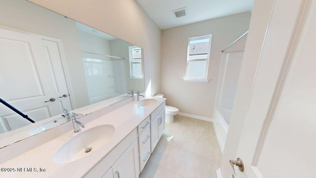 Furnished interior view inside a new home in Lakes at Bella Lago, Green Cove Springs (Image 6).