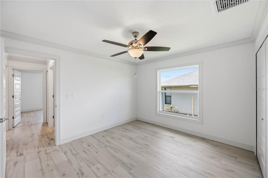 Spacious, unfurnished interior of a new home in , Port Charlotte (Image 53).