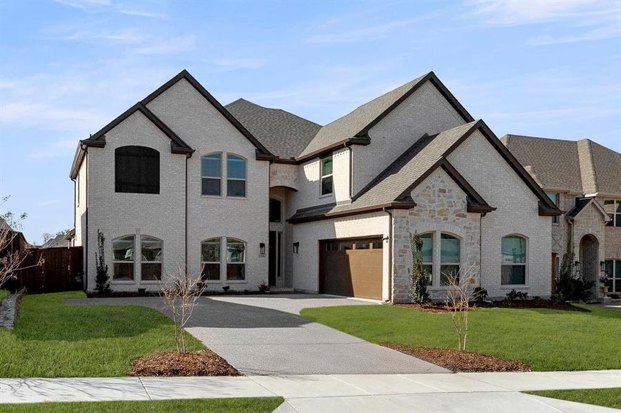 Front exterior of a new home in Inspiration, Lucas, TX, highlighting curb appeal (Image 20). Front exterior of a new home in Inspiration, Lucas, TX, highlighting curb appeal (Image 20).