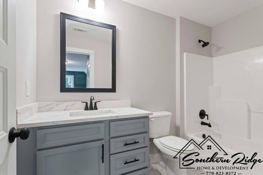 Furnished interior view inside a new home in , Roopville (Image 12).