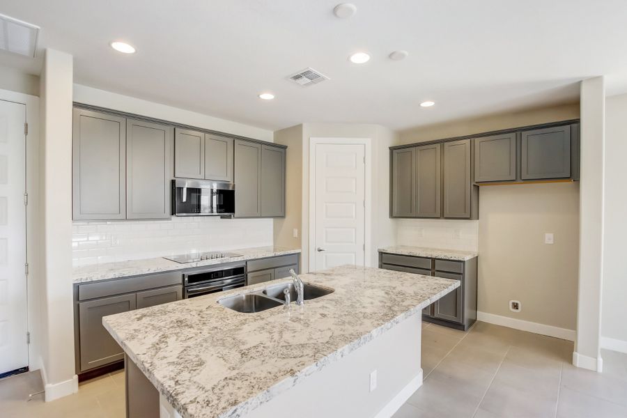 Representative furnished interior of a home built from the Castillo Series - Acacia by Brightland Homes in Castillo at Anderson Parc, Buckeye (Image 6). Representative furnished interior of a home built from the Castillo Series - Acacia by Brightland Homes in Castillo at Anderson Parc, Buckeye (Image 6).