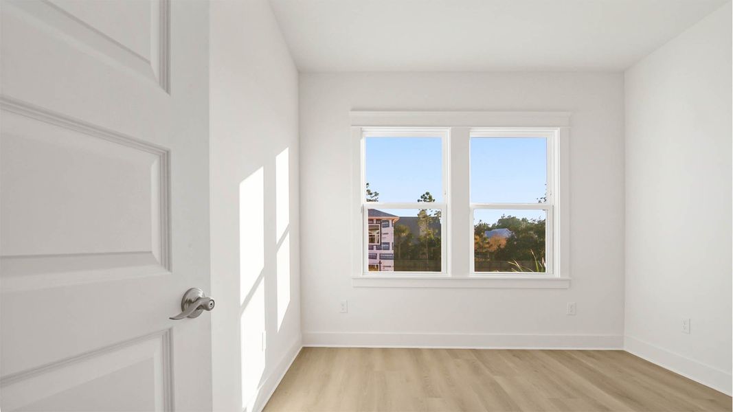 Representative unfurnished interior of a home built from the Trenton by D.R. Horton in Parkside, Santa Rosa Beach (Image 29).