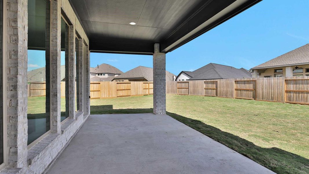 Exterior details and patio area of a home in Candela South 50', Richmond (Image 3). Exterior details and patio area of a home in Candela South 50', Richmond (Image 3).