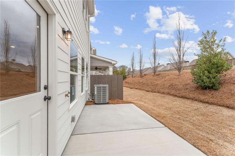 Exterior details and patio area of a home in Bluffs at Bells Ferry, Marietta (Image 16).