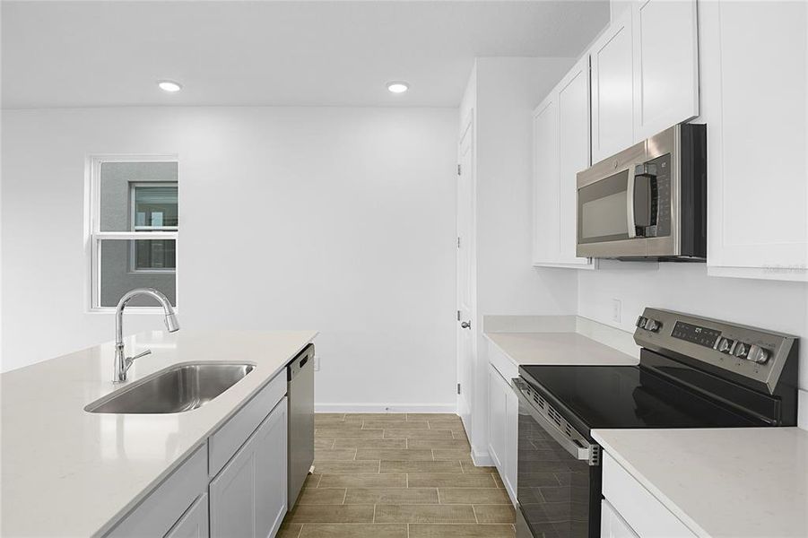 Furnished interior view inside a new home in Seasons at Scenic Terrace, Lake Hamilton (Image 7).