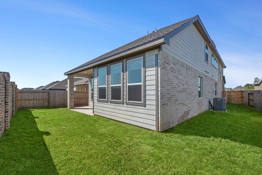 Exterior details and patio area of a home in Emory Glen, Magnolia (Image 4).