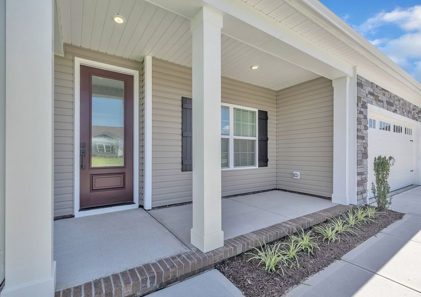 The front porch is the perfect place to enjoy a cup of coffee.