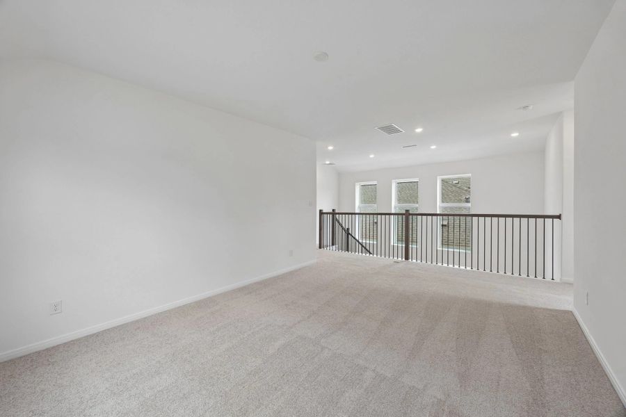 Upstairs loft. Sample product photo. Actual exterior and interior selections may vary by homesite. Photo may be virtually staged.