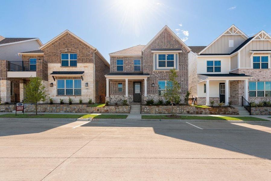 Front exterior of a new home in Bayside, Rowlett, TX, highlighting curb appeal (Image 21).