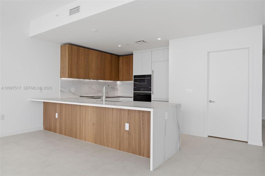 Furnished interior view inside a new home in , Miami (Image 7).