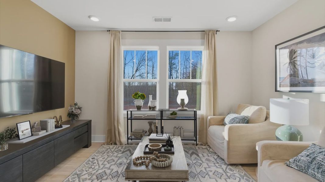 Top-notch design defines this loft with hardwood floors and an open, airy layout at this Pelham Crossing villa