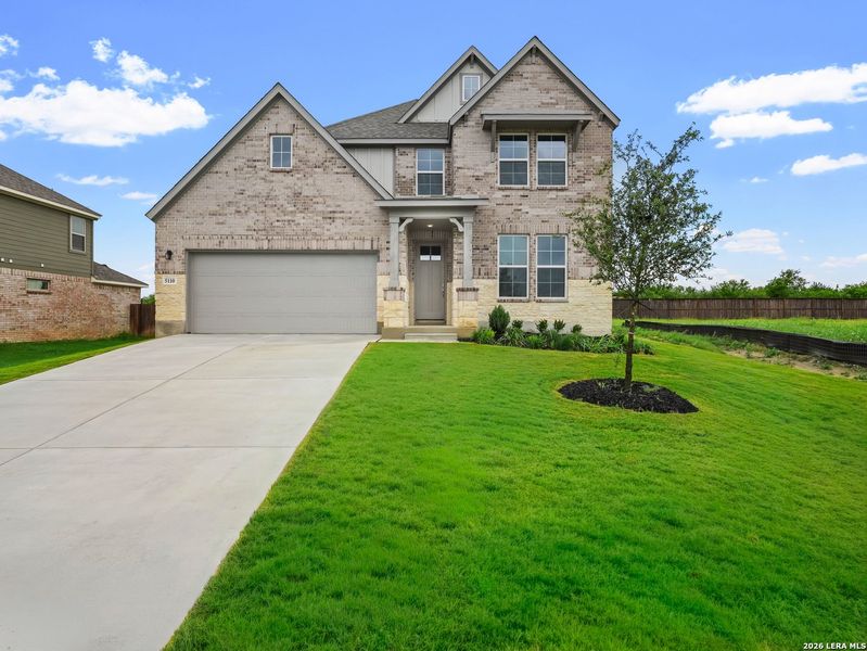 Front exterior of a new home in Parklands Estates, Schertz, TX, highlighting curb appeal (Image 1). Front exterior of a new home in Parklands Estates, Schertz, TX, highlighting curb appeal (Image 1).