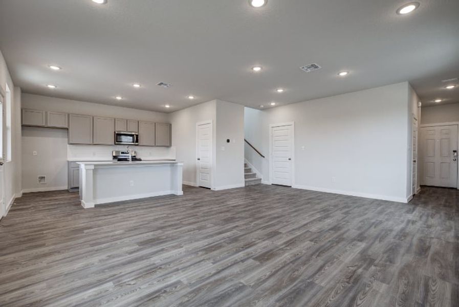 A large empty kitchen. A large empty kitchen.