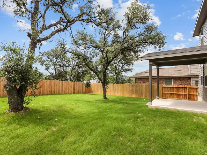 Exterior details and patio area of a home in Bricewood, San Antonio (Image 28).