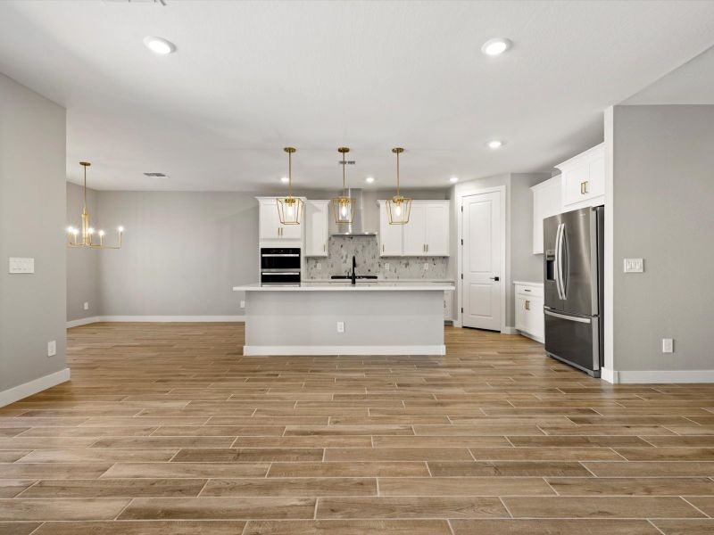 Spacious, unfurnished interior of a new home in Blossom Rock Reserve Series, Apache Junction (Image 9). Spacious, unfurnished interior of a new home in Blossom Rock Reserve Series, Apache Junction (Image 9).