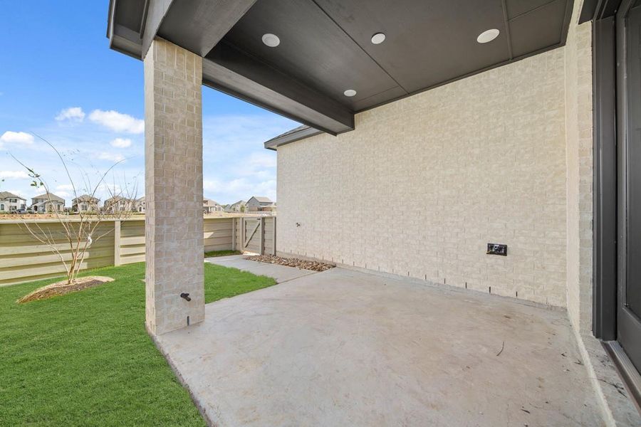 Covered patio with prewire for a fan and a gas line!