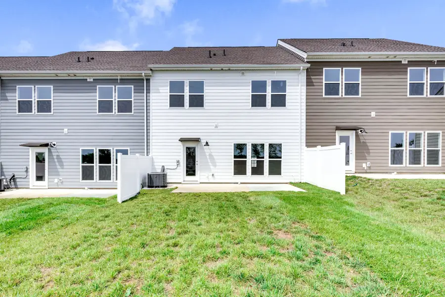 Exterior details and patio area of a home in Harvest Point, Spring Hill (Image 4).