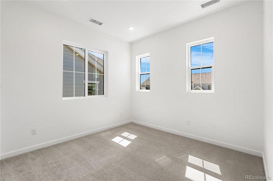 Spacious, unfurnished interior of a new home in Harmony at Solstice, Littleton (Image 30).