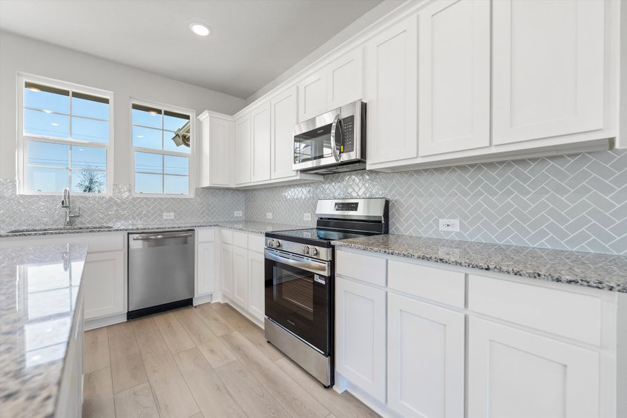 Furnished interior view inside a new home in Clear Sky Addition, Valley View (Image 8).