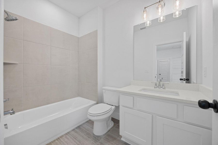 Furnished interior view inside a new home in Provence - 60', Austin (Image 13). Furnished interior view inside a new home in Provence - 60', Austin (Image 13).