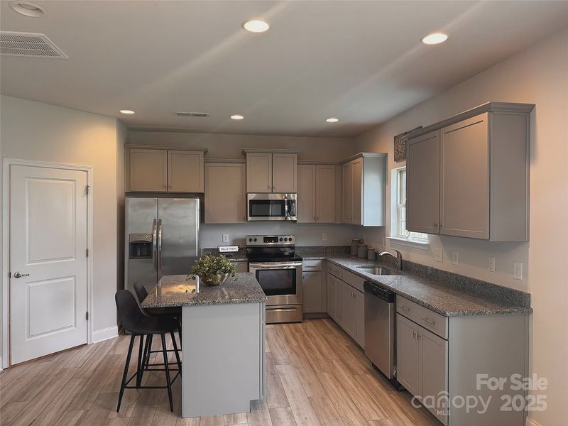 Furnished interior view inside a new home in Village at Parkside, Gastonia (Image 9).