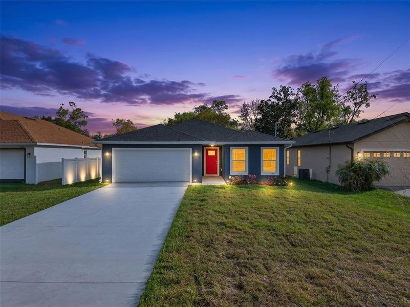 Front exterior of a new home in , Orlando, FL, highlighting curb appeal (Image 25).