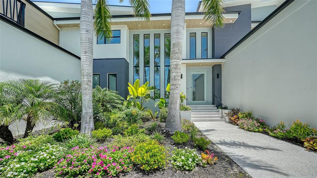 Front exterior of a new home in , Sarasota, FL, highlighting curb appeal (Image 31).