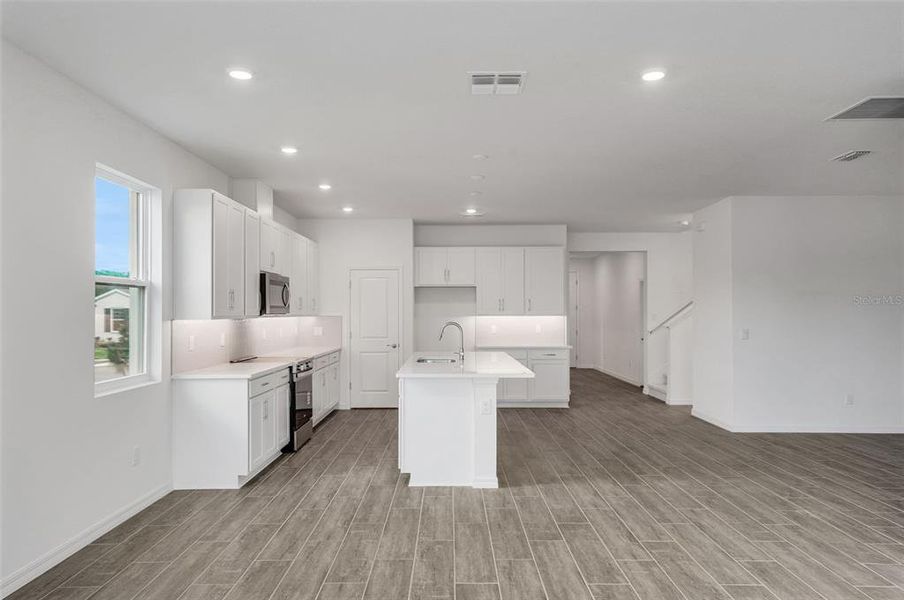 Furnished interior view inside a new home in Tuscan Hills, Dade City (Image 12).
