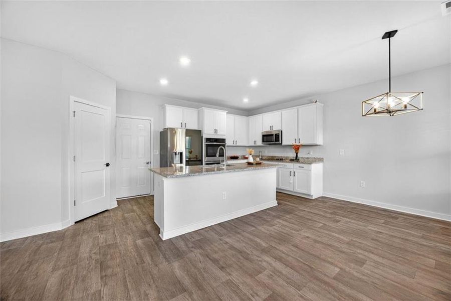 Furnished interior view inside a new home in The Enclave at Dial Farm Phase III, Walnut Grove (Image 10).