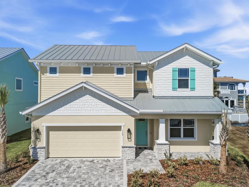 Front exterior of a new home in Beachview Cove, Ormond Beach, FL, highlighting curb appeal (Image 2).