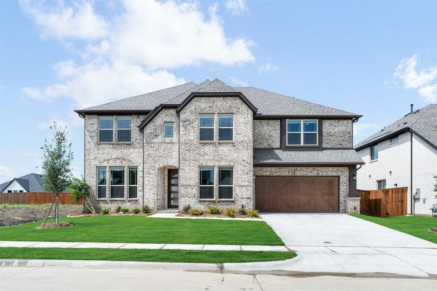 Front exterior of a new home in Sonoma Verde, Rockwall, TX, highlighting curb appeal (Image 2).