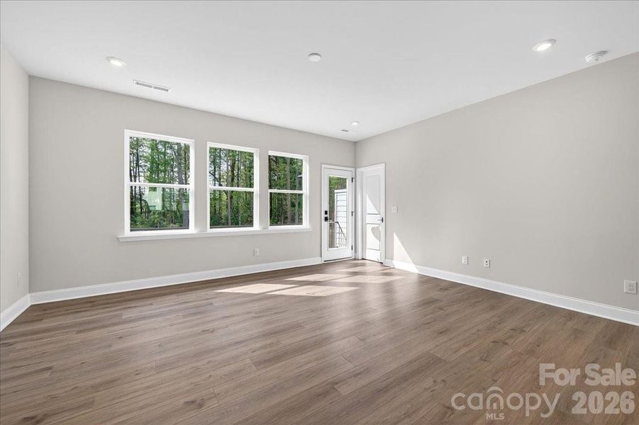 Light filled living room with access to outdoor living