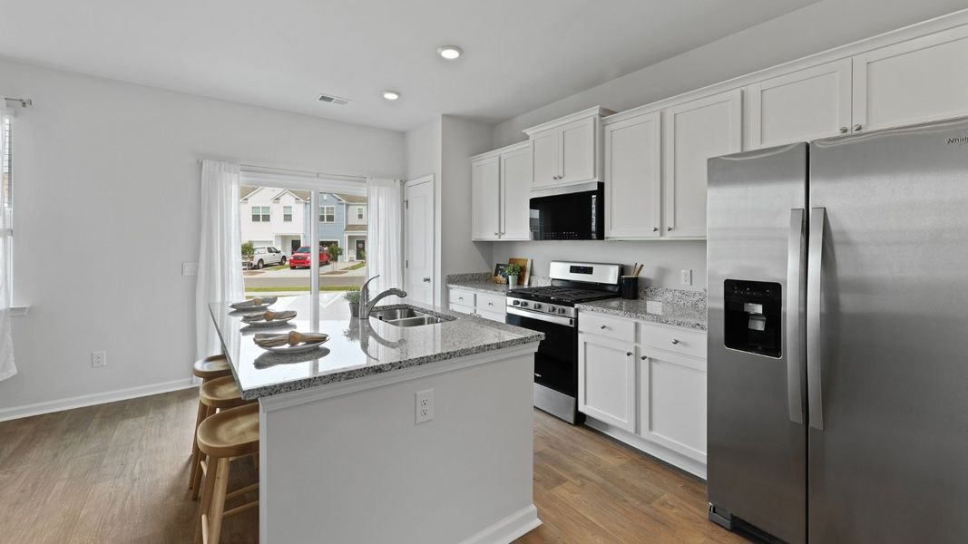 Representative furnished interior of a home built from the DUNCAN by D.R. Horton in Carolina Groves Townhomes, Moncks Corner (Image 8).