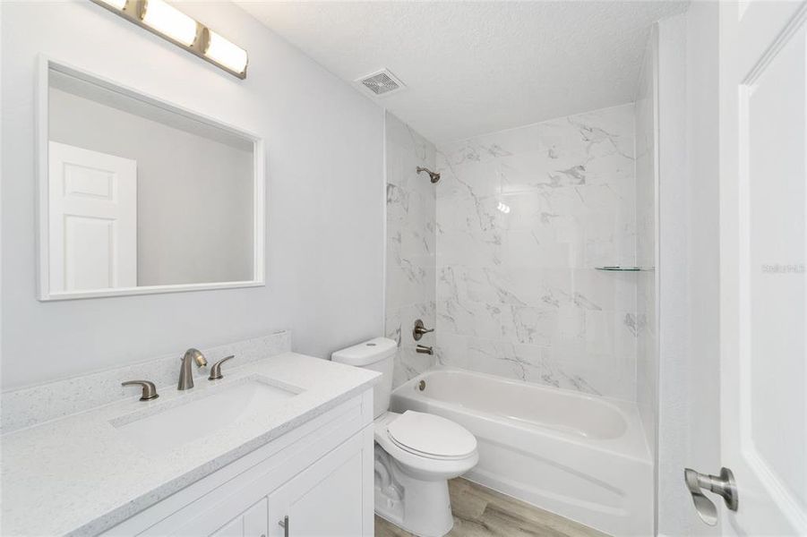 Furnished interior view inside a new home in , Dunnellon (Image 9).