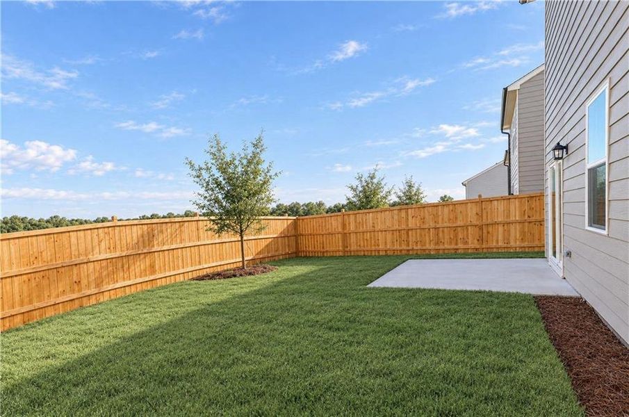 Exterior details and patio area of a home in Timber Ridge, Douglasville (Image 3).