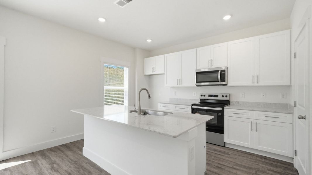 Furnished interior view inside a new home in The Hideaway at Fox Meadows, Bluff City (Image 3).