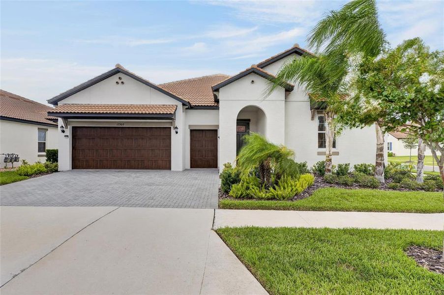 Front exterior of a new home in Southshore Bay Active Adult, Wimauma, FL, highlighting curb appeal (Image 28).