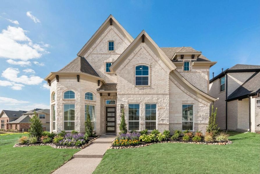 Representative exterior photo of a completed home built from the Royal Martinique by Grand Homes in Prairie Ridge, Venus, TX (Image 17).