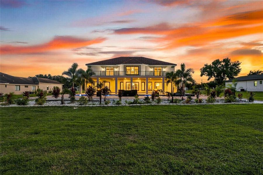 Front exterior of a new home in , Thonotosassa, FL, highlighting curb appeal (Image 32). Front exterior of a new home in , Thonotosassa, FL, highlighting curb appeal (Image 32).