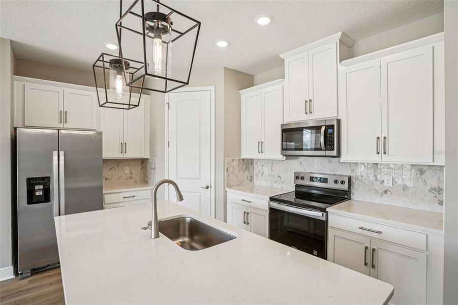 Furnished interior view inside a new home in Legends Preserve - Signature Series, Daytona Beach (Image 9).