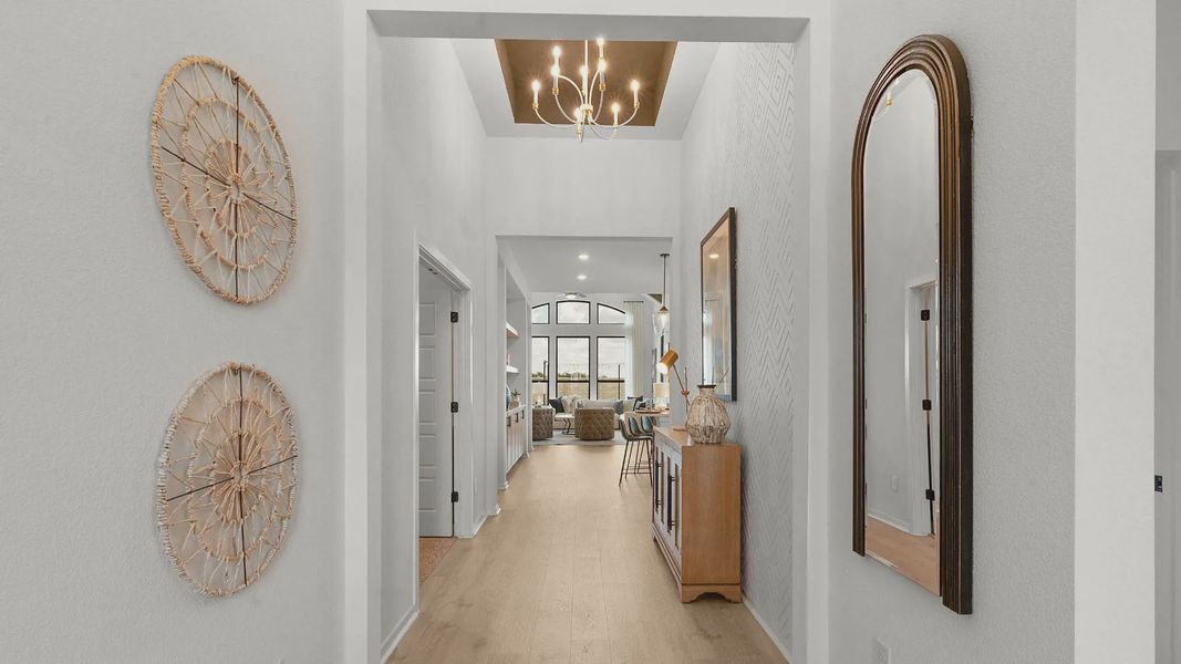 Representative furnished interior of a home built from the Mariah by Chesmar Homes in University Heights, Round Rock (Image 8).