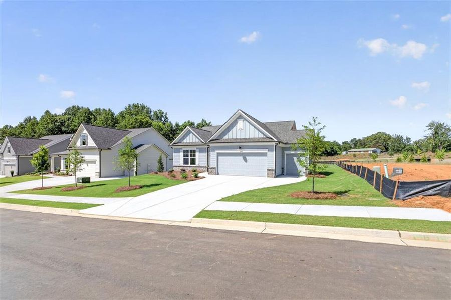 Front exterior of a new home in , Athens, GA, highlighting curb appeal (Image 23).